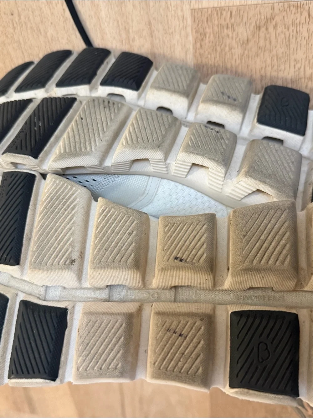 On Women’s Running Shoe — White with Black Accents